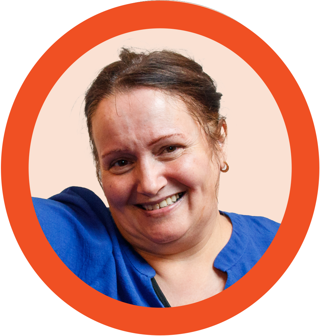 A photo of a smiling woman inside an orange circle