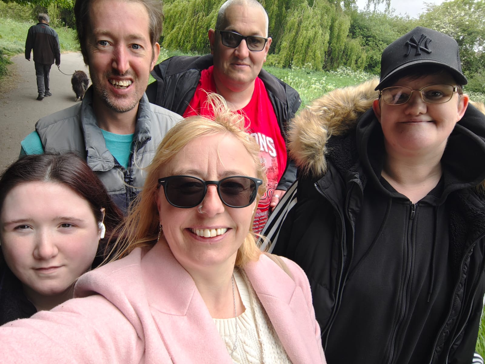 A selfie showing a group of people in the park