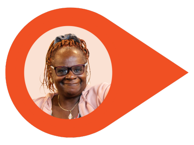 A smiling woman with glasses