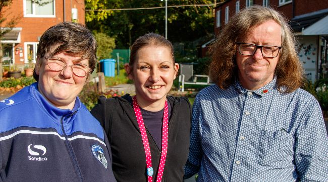 A photo of staff with a KeyRing Member